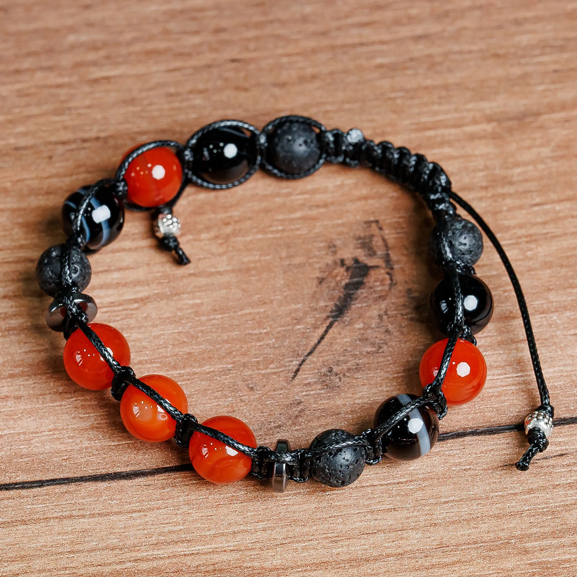 Adjustable Orange and Black Multi-Gemstone Beaded Bracelet - Orange Realms | NOVICA