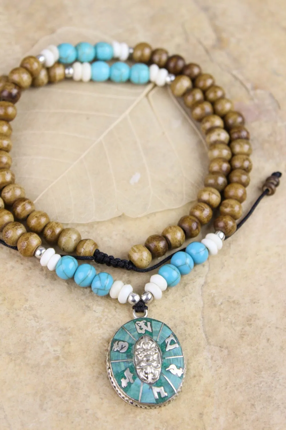 Bone and Turquoise Compassion Mantra Pendant Necklace