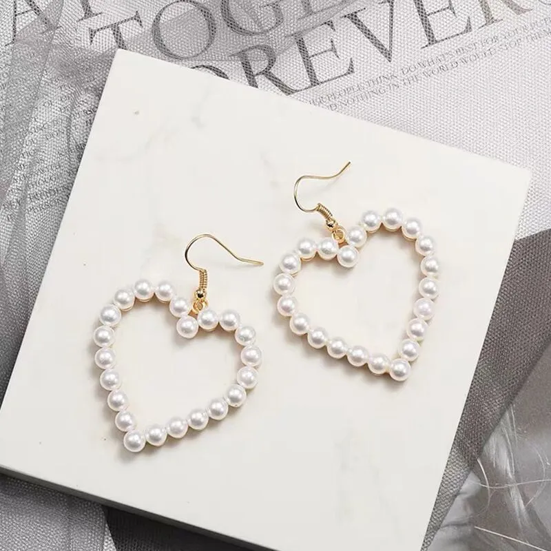 Women's Sweet Temperament Hollow Peach Heart Earrings